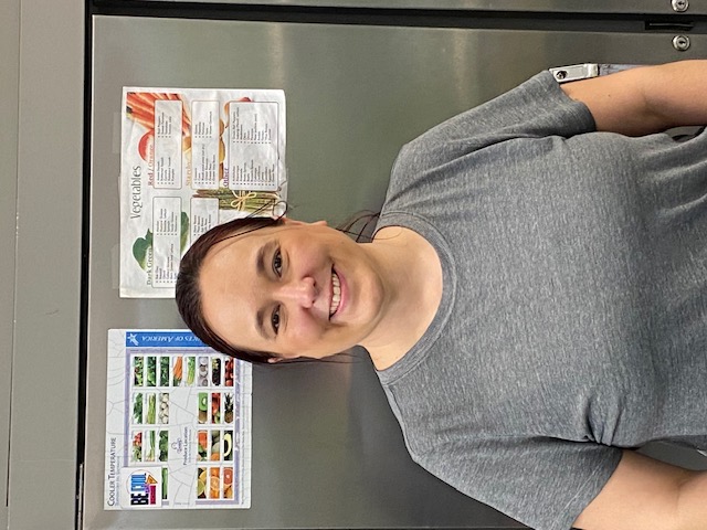 Mrs. Moraca in the kitchen.